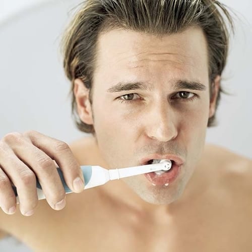 Twice-a-day teeth brushing should be complemented by twice-a-year cleanings at the dentist.